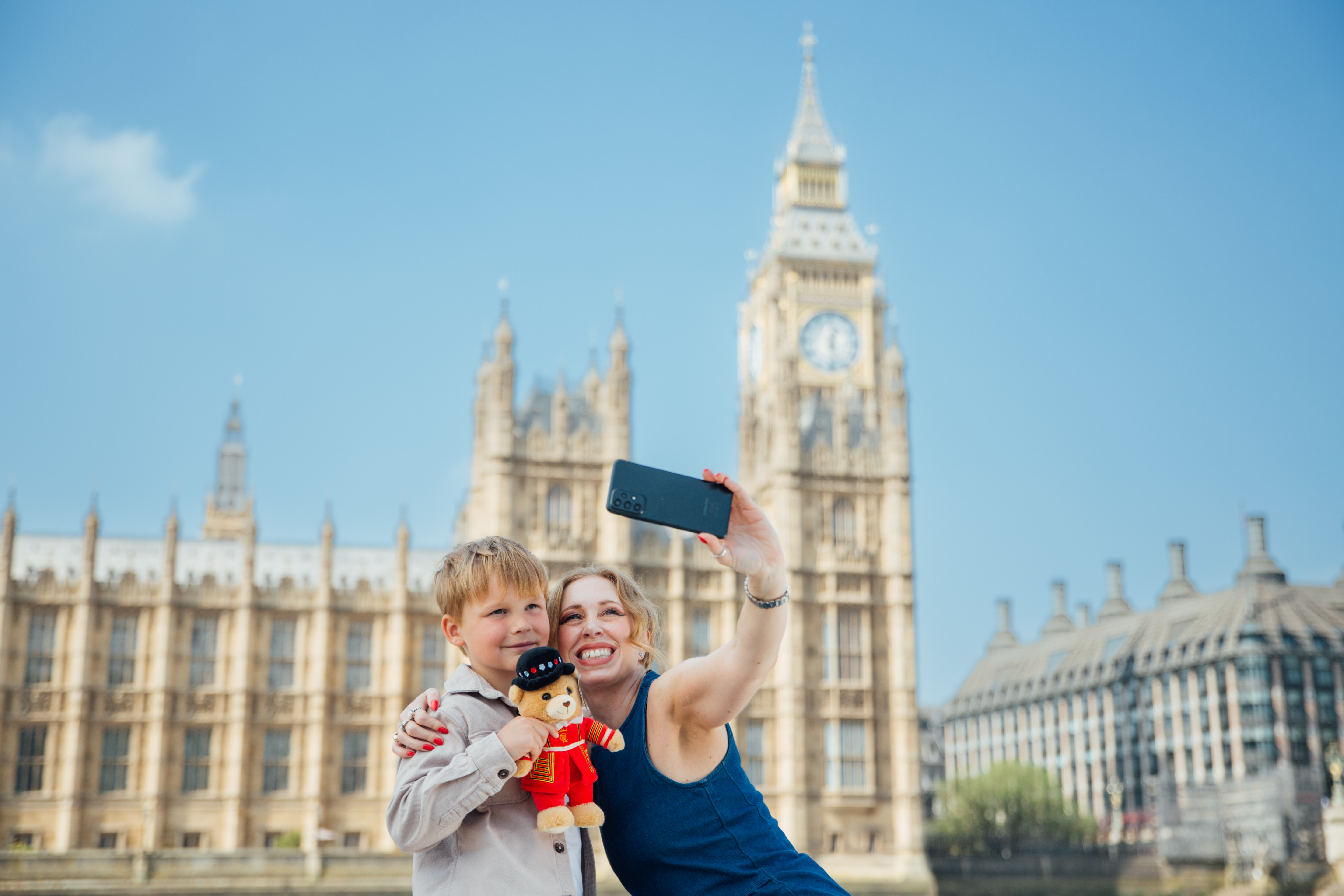 Family enjoying the view of the Houses of Parliament