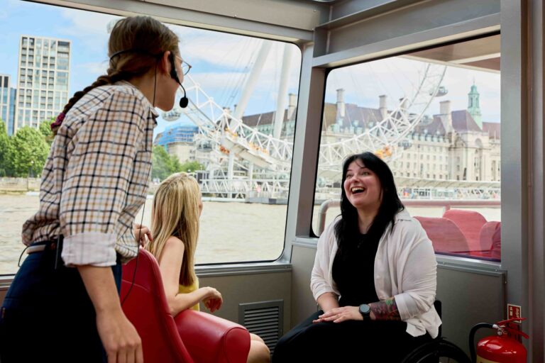 Guided, accessible River Thames boat tour passing the London Eye